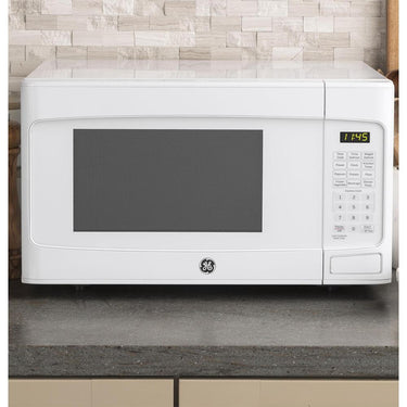 GE 1.1 Cu. Ft. Capacity Countertop Microwave Oven with 2 YR Warranty Bundle