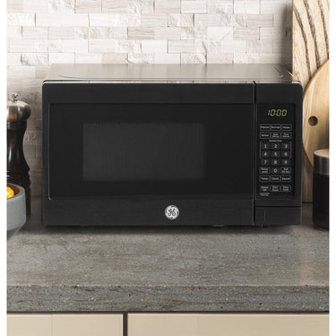 GE 0.7 Cu. Ft. Countertop Microwave Oven w/ Oven Mitt + 2 YR Warranty Bundle