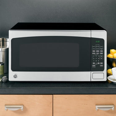 GE 2.0 Cu. Ft. Capacity Countertop Microwave Oven Open Box with 1 Year Warranty