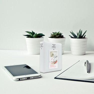 Deco Essentials 2" x 3" White 64 Page Photo Album - Fuji Instax Mini 70, 7s, 8, 90, 50, and 25s