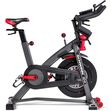 Schwinn IC4 Indoor Cycling Bike with Tablet Holder + Massage Gun Bundle