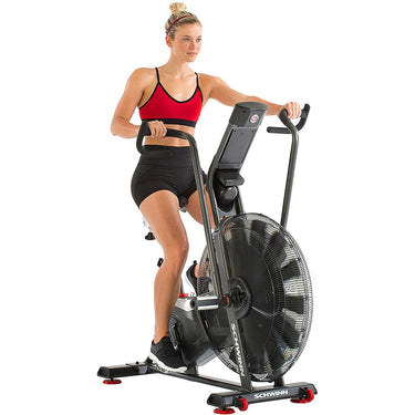 Schwinn 100625 AD7 Airdyne Excersize Bike w/ Massage Gun Bundle