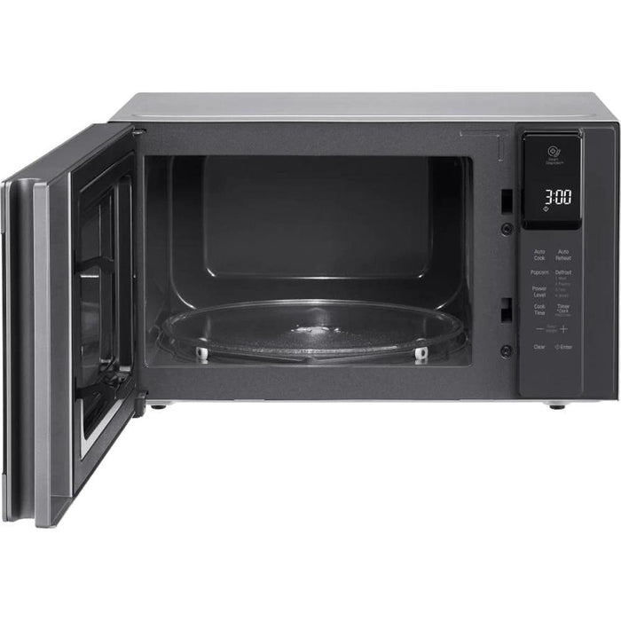 LG 0.9 Cu. Ft. NeoChef Countertop Microwave in Stainless Steel -open box